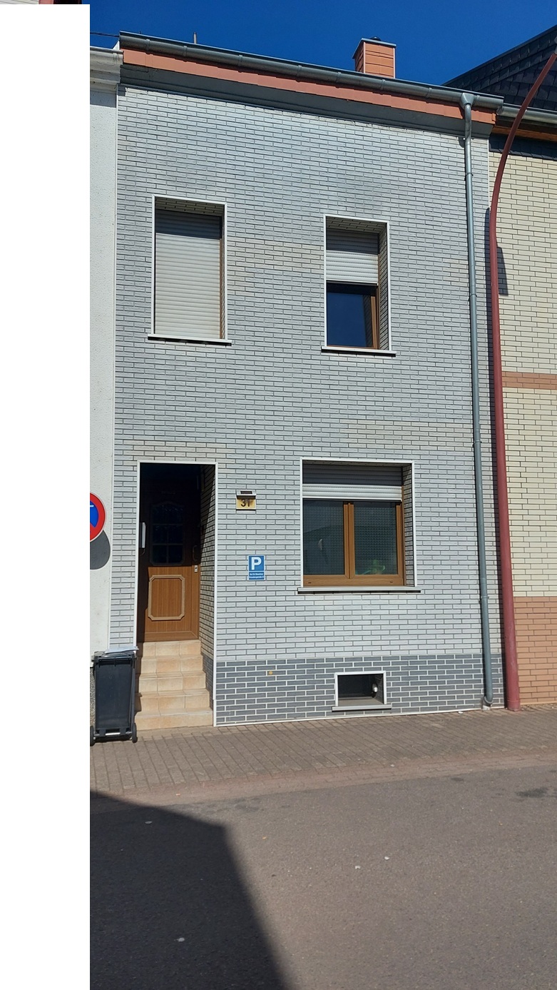 Vermietetes Reihenmittelhaus in Merzig – citynah mit Garten und Pool